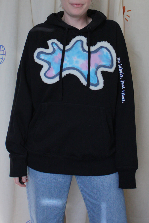 black hoodie with colourful front design, soft white fabric, pretty blue, blue and purple tie-dye, repurposed in canada