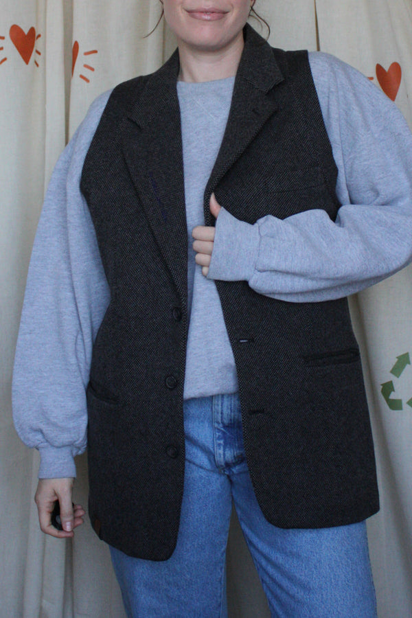 dark wool blazer upcycled into vest, repurposed secondhand clothing. 