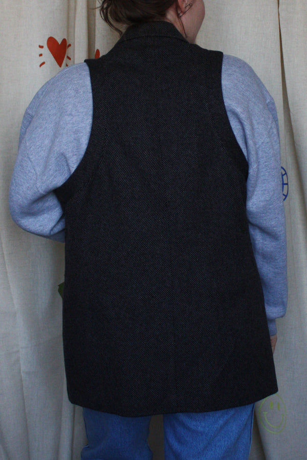 dark wool blazer upcycled into vest, repurposed secondhand clothing. 