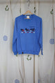 periwinkle upcycled grandma sweater with hearts, sheep and house motif on front, repurposed in canada