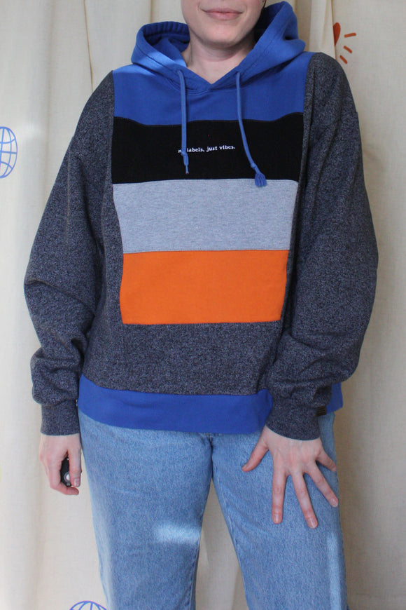 upcycled blue, black, grey and orange hoodie, repurposed in canada