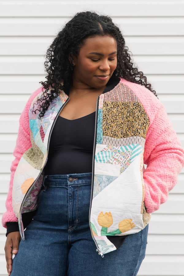 one of a kind bomber jacket, made from quilt scraps, beautiful pastels and vibrant pink sleeves, repurposed in canada