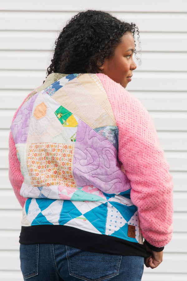 one of a kind bomber jacket, made from quilt scraps, beautiful pastels and vibrant pink sleeves, repurposed in canada