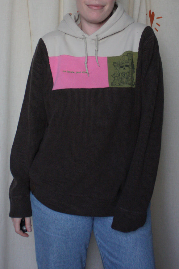 cream hoodie with brown knit and pink and green patches, upcycled in canada