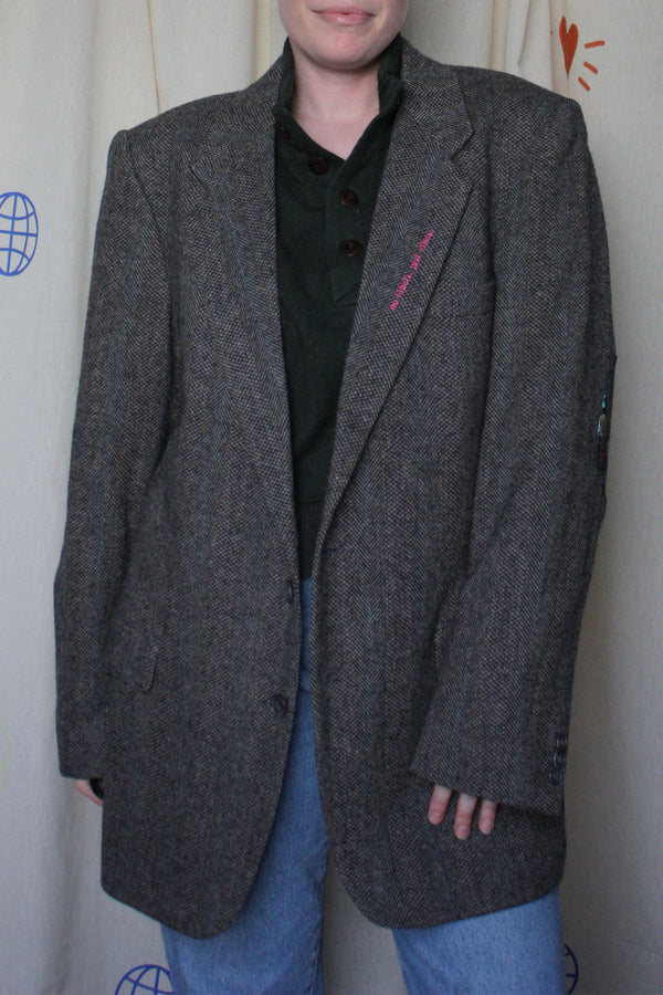 classic dark grey tweed blazer, upcycled with floral faux leather elbow patches, repurposed in canada