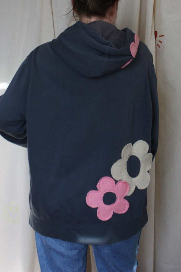 slate grey upcycled hoodie with pink and cream flowers throughout, repurposed in canada