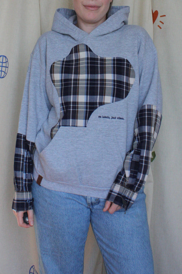 upcycled grey and plaid hoodie, with plaid sleeves, repurposed in canada