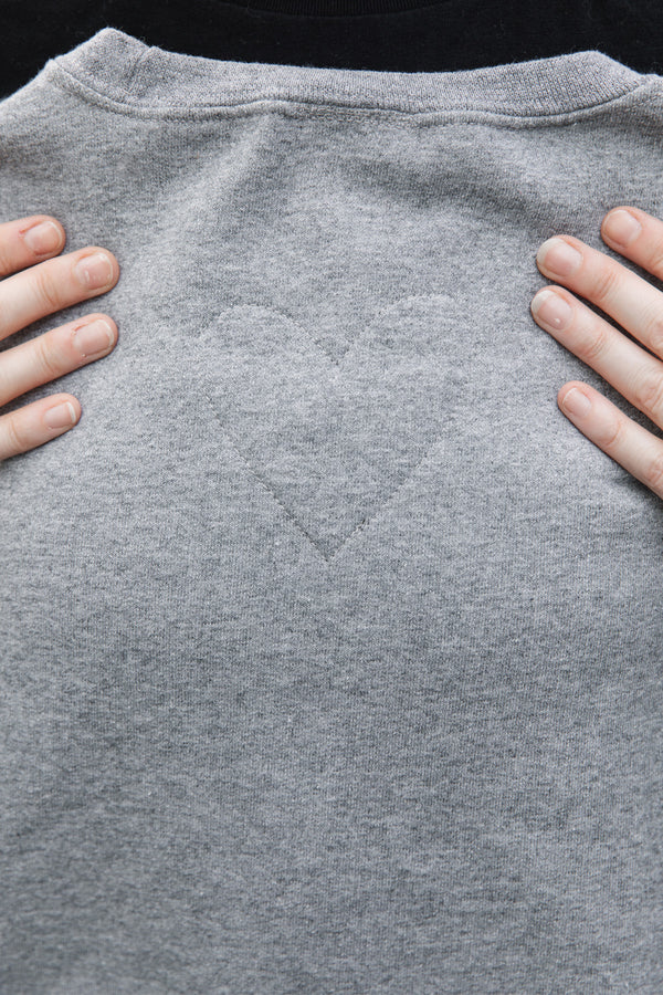 heart stitched on back neck of light grey sweater, unisex and oversized, sewn in canada