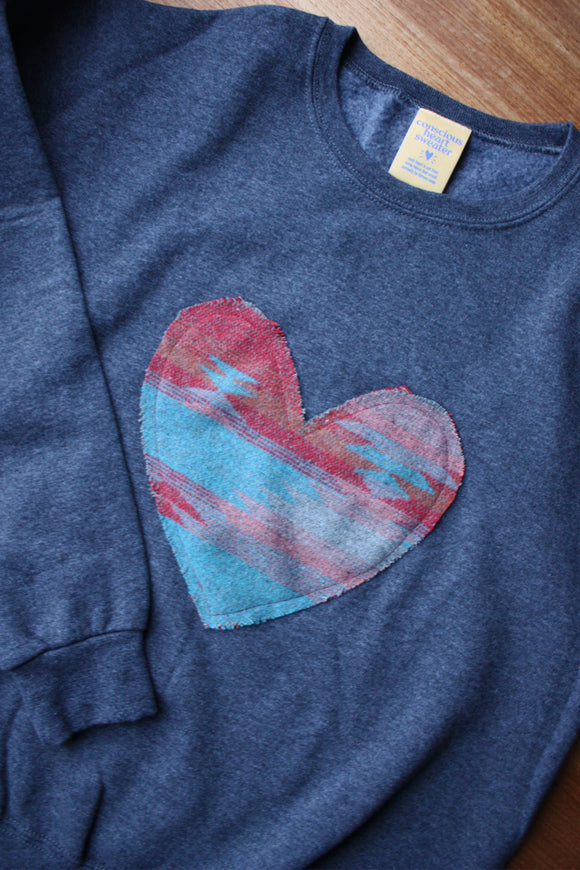 red and blue heart sweater, cut from scrap fabric. upcycled oversized sweater, hand stitched in ottawa