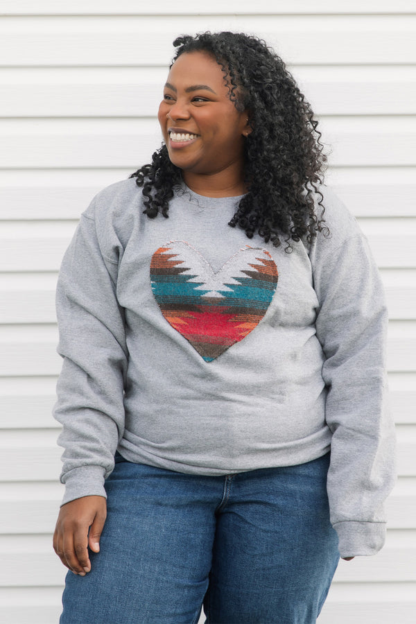 Indigenous multi-coloured pattern heart on light grey sweater, unisex and oversized, sewn in canada