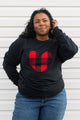 Red and black lumberjack plaid heart on black sweater, unisex and oversized, sewn in canada