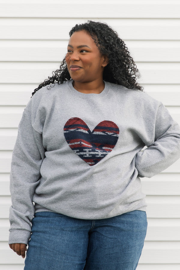 indigenous woven heart sewn on heather grey sweater, unisex and oversized fit, sewn in canada