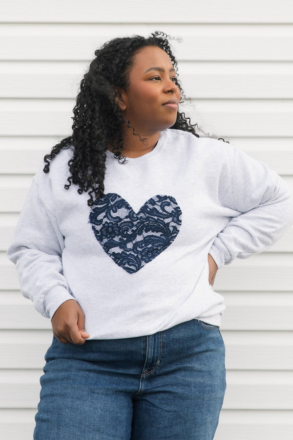 navy lace heart on light grey sweater, unisex and oversized fit, sewn in canada