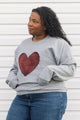 Indigenous printed heart sewn on heather grey sweater, unisex and oversized fit, sewn in canada