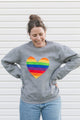 quilted rainbow heart sewn on heather grey sweater, unisex and oversized fit, sewn in canada