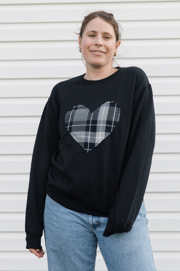 blue plaid heart sewn on black sweater, unisex and oversized fit, sewn in canada