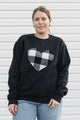 white plaid heart sewn on black sweater, unisex and oversized fit, sewn in canada