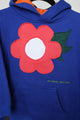 blue upcycled sweater worn by 5 year old, features coral flower with leaves on it, upcycled in canada