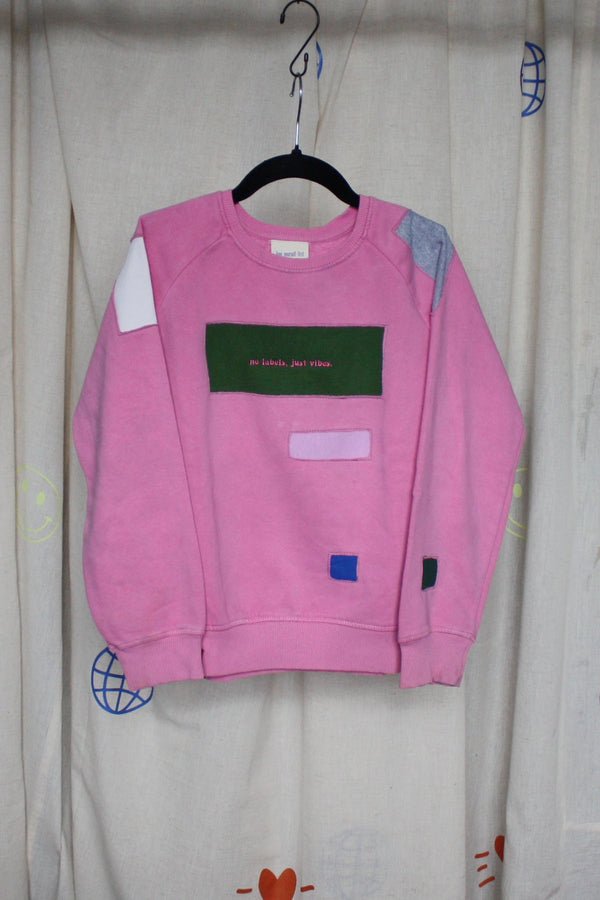 kids pink upcycled crewneck worn by 6 years, with pops of colour, repurposed in canada