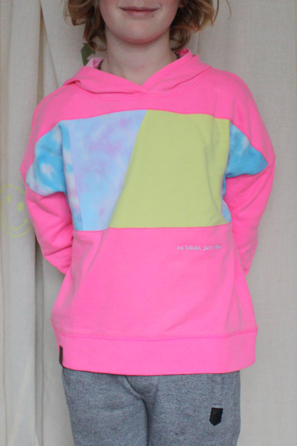 neon pink hoodie worn by 6 year old, upcycled with tie dye and yellow, repurposed in canada