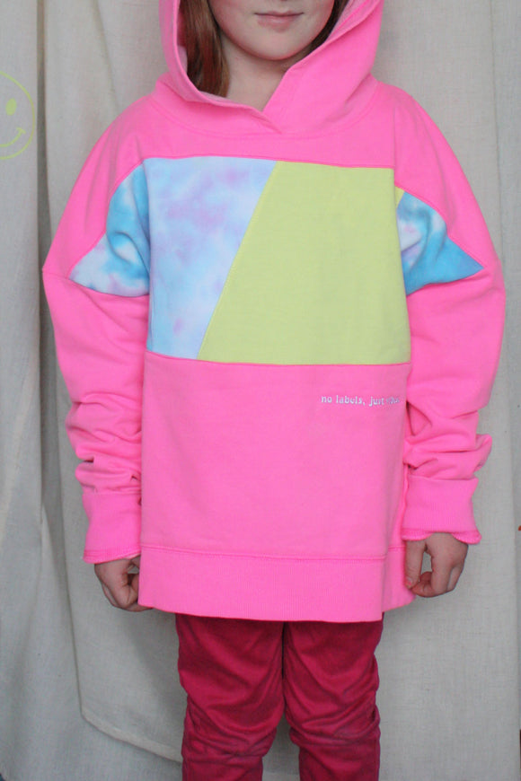 neon pink hoodie worn by 6 year old, upcycled with tie dye and yellow, repurposed in canada