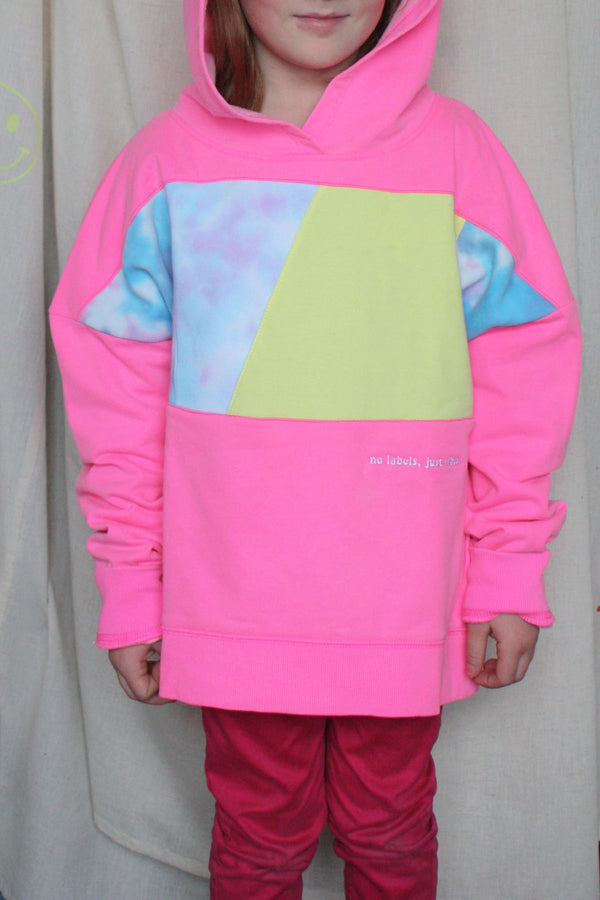 neon pink hoodie worn by 6 year old, upcycled with tie dye and yellow, repurposed in canada