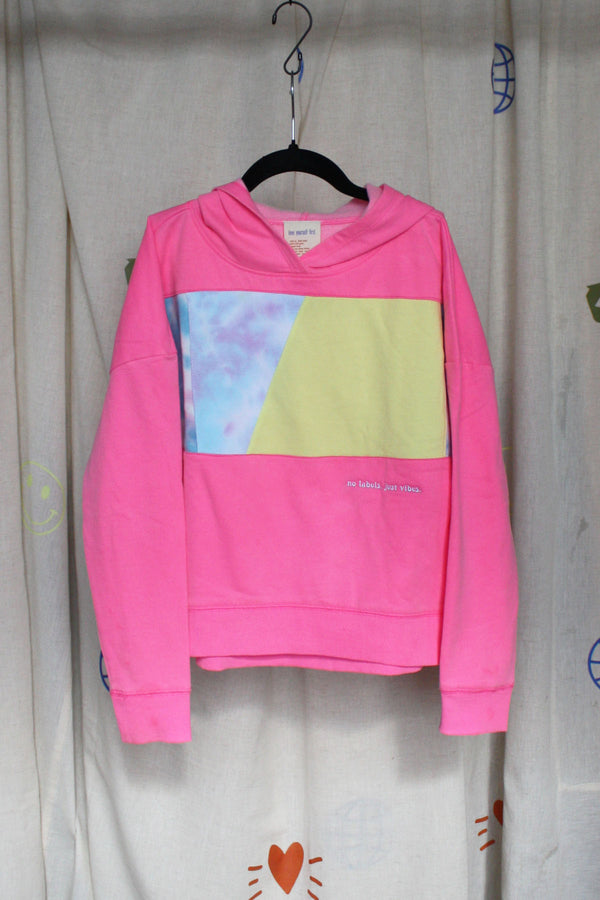 neon pink hoodie worn by 6 year old, upcycled with tie dye and yellow, repurposed in canada