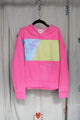 neon pink hoodie worn by 6 year old, upcycled with tie dye and yellow, repurposed in canada