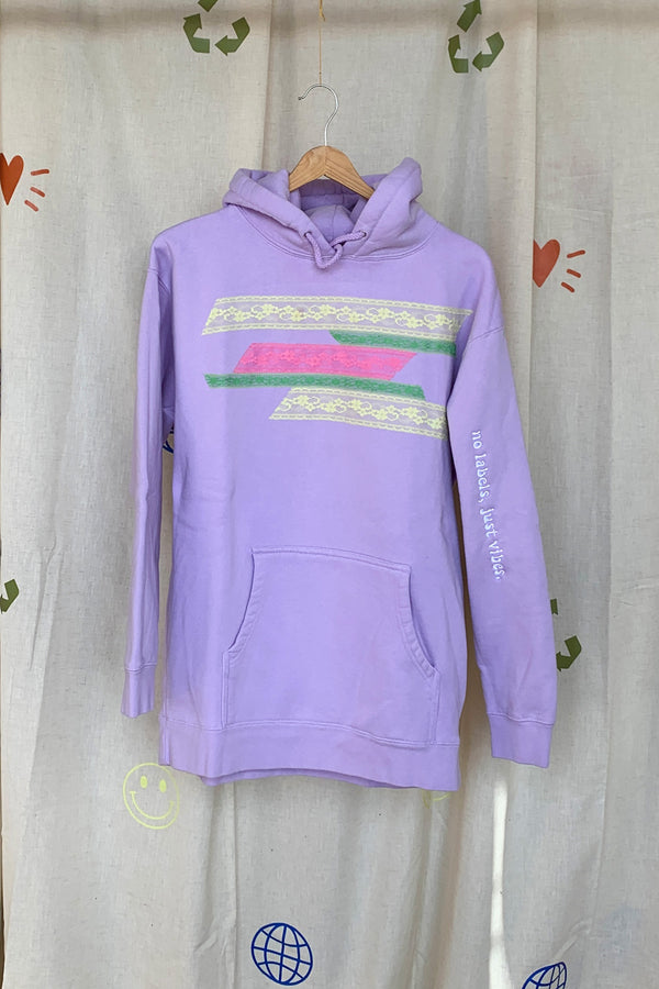 lavender upcycled hoodie with yellow, green and pink lace motif on front, repurposed in canada