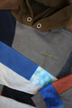 upcycled colourful patchwork hoodie, repurposed in canada, detail shot of 'no labels, just vibes.' embroidery