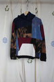 upcycled bleached sweater with navy hood and pops of cranberry, repurposed in canada