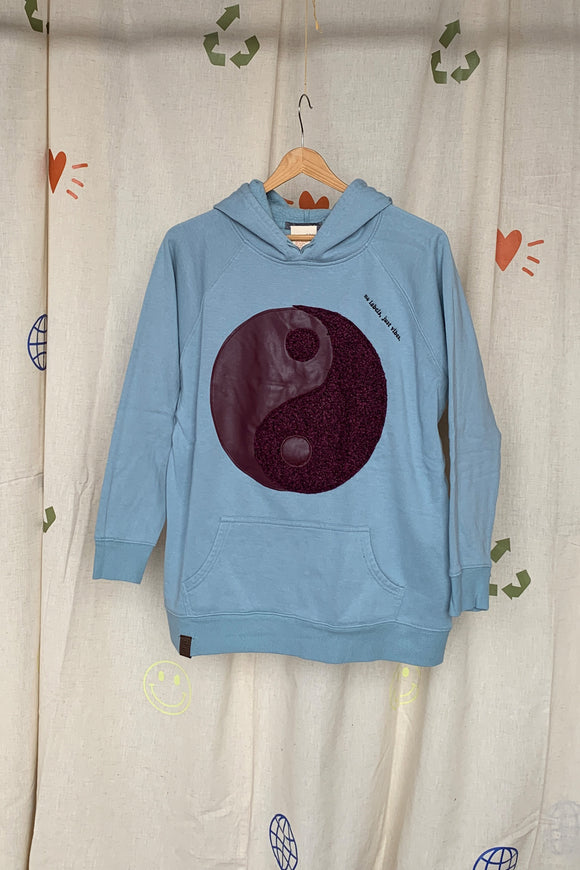 aqua upcycled hoodie with plum coloured yin yang symbol repurposed in canada