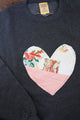 one of a kind quilted heart sewn on charcoal sweaters, unisex and oversized fit, hand cut and sewn in canada