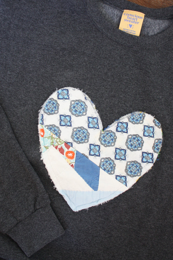 one of a kind quilted heart stitched on charcoal sweater, unisex and oversized fit, hand cut and sewn in canada