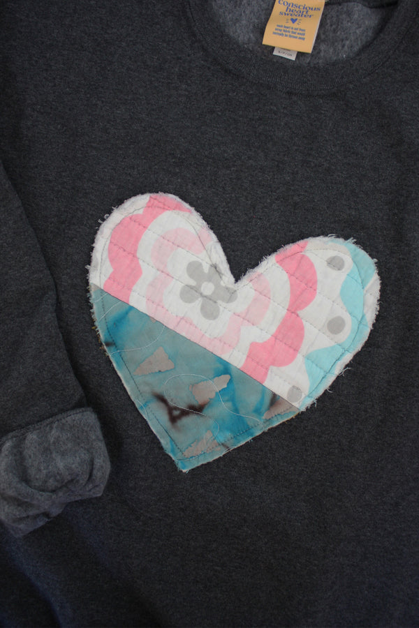 one of a kind quilted heart stitched on charcoal sweater, unisex and oversized fit, hand cut and sewn in canada