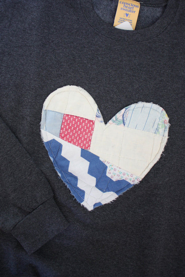 one of a kind quilted heart stitched on charcoal sweater, unisex and oversized fit, hand cut and sewn in canada