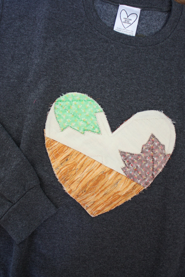 one of a kind quilted heart stitched on charcoal sweater, unisex and oversized fit, hand cut and sewn in canada