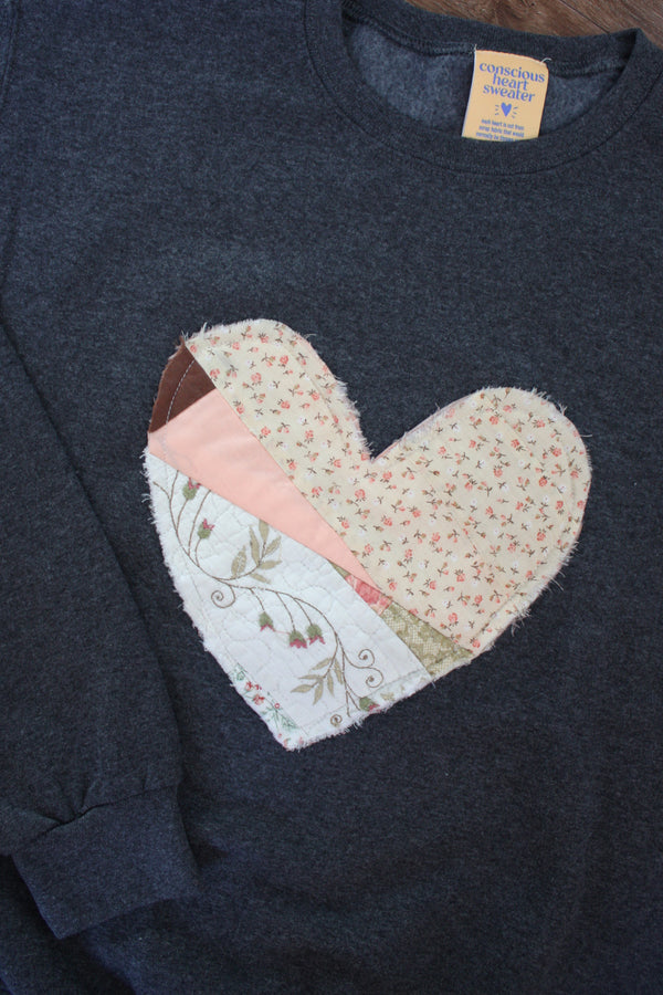 one of a kind quilted heart stitched on charcoal sweater, unisex and oversized fit, hand cut and sewn in canada