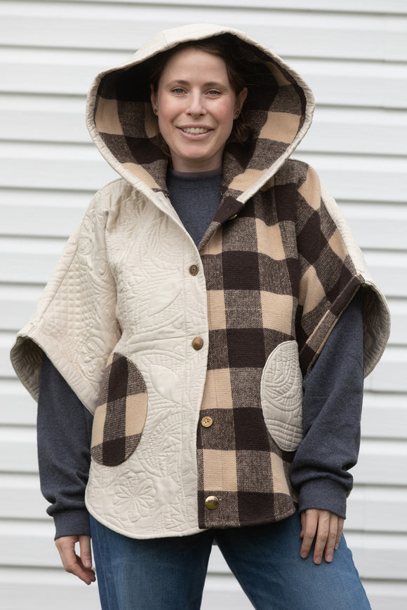 upcycled poncho, featuring a big hood, pockets and oversized style, made from quilts and scrap fabric, made in canada