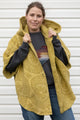 oversized poncho with hood and pockets, made with green chenille blanket upcycled and made in canada