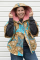 blue and gold quilt upcycled into the perfect poncho, it features a cozy hood, pockets and the perfect cut for layering up all your fall outfits, made in canada