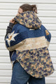 blue quilt repurposed into clare poncho, features oversized fit meant for layering, made in canada