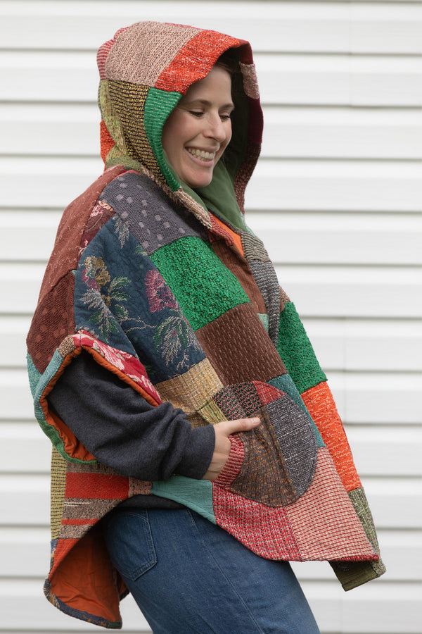 colourful poncho upcycled from handmade quilt, features big hood, pockets and oversized fit, upcycled and made in canada