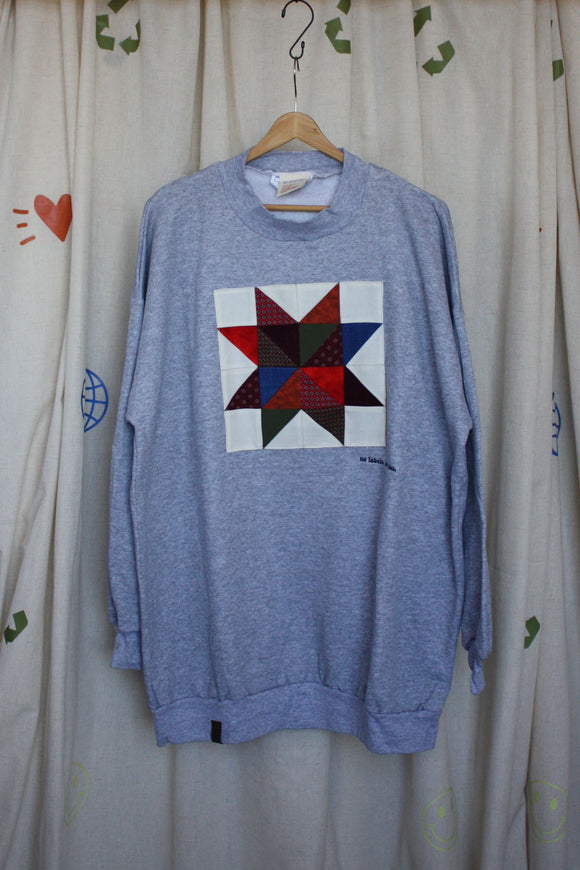 grey sweater with colourful quilt block on the front, repurposed secondhand sweater, upcycled clothing, made in canada