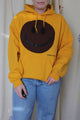 yellow upcycled sweater with brown smiley face, repurposed in canada